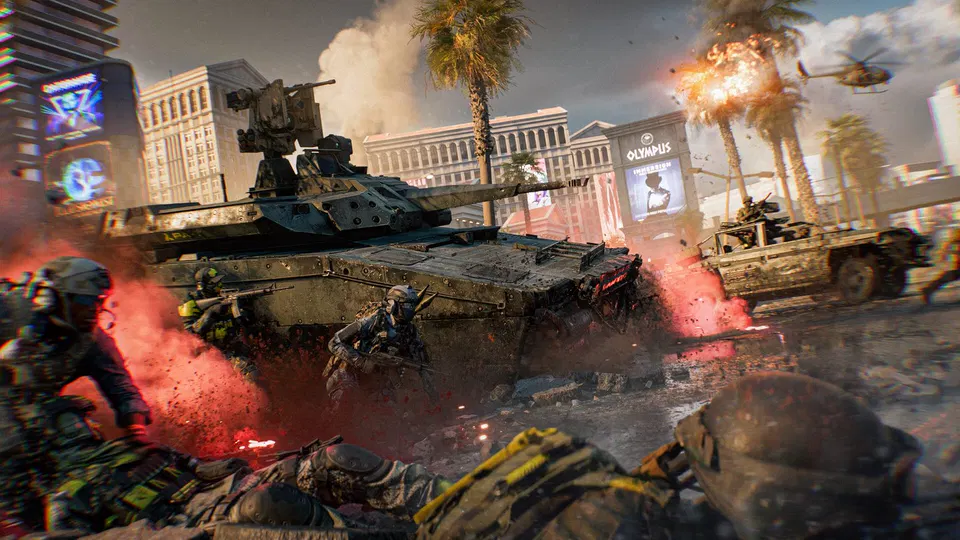 Battlefield 6: tank a obrněné vozidlo v ulici s palmami, červený kouř a vojáci v boji