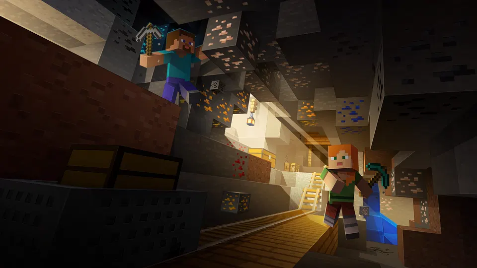 Minecraft – těžba v šachtě osvětlené pochodněmi