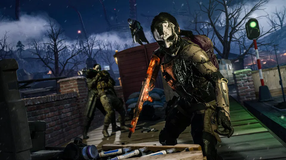 Call of Duty: Modern Warfare 4 – voják s rozzářenou oranžovou zbraní na střeše v noci mezi pytli s pískem